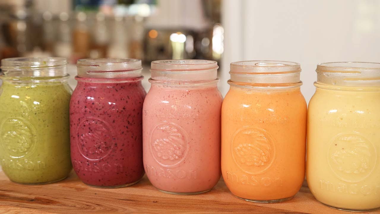 Tropical breakfast smoothie with pineapple, mango, and banana in a glass, ready for a busy morning