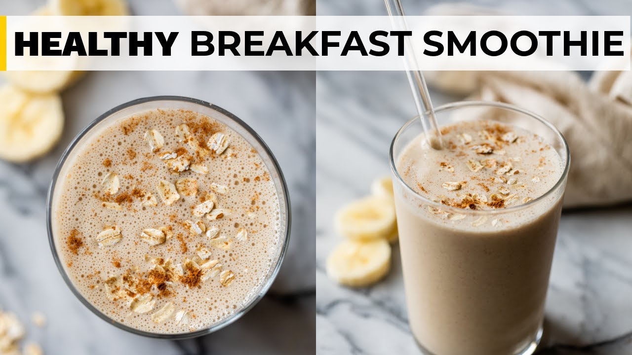 A thick banana oatmeal protein shake in a glass, topped with a sprinkle of cinnamon